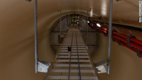 A ladder runs up the inside of a wind turbine at the Traverse wind farm. Workers must climb up nearly 300 feet in order to perform inspections and maintenance on the turbines.