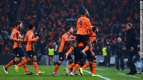 Darijo Srna celebrates after scoring against Borussia Dortmund in the Champions League at the Donbass Arena in 2013. The following year, Shakhtar was forced from its home.