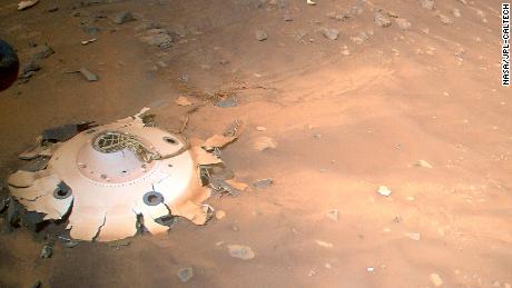 The backshell and its debris field can be seen from Ingenuity&#39;s position above the landing site.