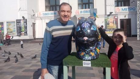 Oleksander Obedinsky is pictured with granddaughter Kira, before Russia&#39;s invasion of Ukraine.