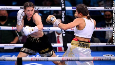 Taylor, left, and Firuza Sharipova fight during thei undisputed ightweight championship bout at M&amp;S Bank Arena in Liverpool, England.