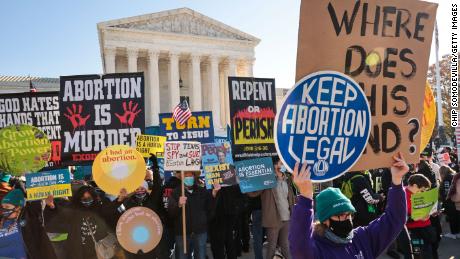 Demonstrators gather in front of the US Supreme Court as the justices hear arguments in Dobbs v. Jackson Women&#39;s Health, a case about a Mississippi law that bans most abortions after 15 weeks, on December 01, 2021 in Washington, DC. (Photo by Chip Somodevilla/Getty Images)