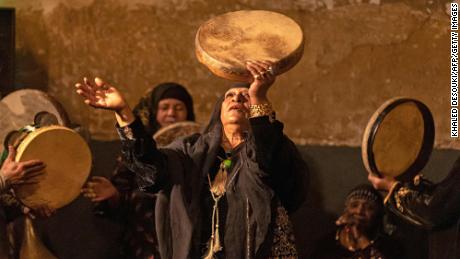 Zar musicians and healers perform their ritual in Cairo late on April 27. The Zar trans religious ceremony, which uses drumming and dancing to cure an illness thought to be caused by a demon, is most prominent in southern Egypt and is practiced further south into the Sudan, though it may be performed anywhere in Egypt. Islam as a pagan practice prohibits the ritual, a type of a healing cult, but it continues to be part of Egypt&#39;s popular culture. 