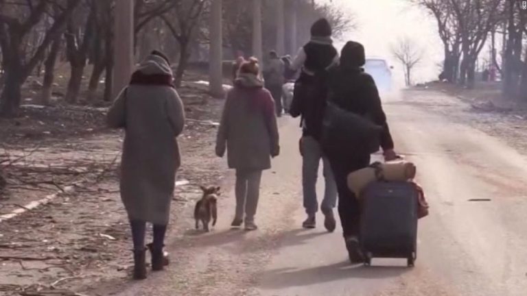 Ukrainians come under fire while fleeing home country