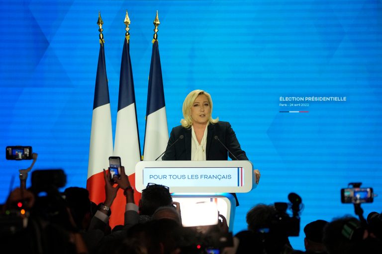 Le Pen concedes election, but calls result a victory