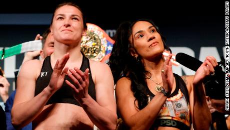 Taylor, left, and Serrano, right, weigh in ahead of Saturday&#39;s fight in New York.