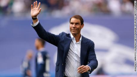 Spanish tennis star Nadal waves to fans in Madrid.