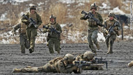 US Marines take part in a joint amphibious exercise with the Japan Ground Self-Defense Force amphibious rapid deployment unit at a training site near Mount Fuji in central Japan, on March 23. 