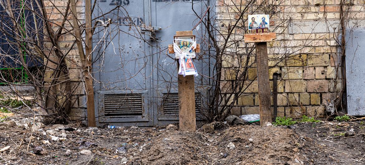 Graves of two victims in Bucha, Ukraine.