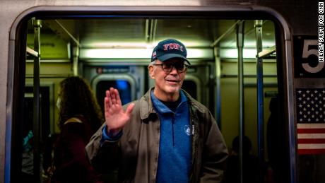 Patrick Curley inside a train at a Times Square-42 Street subway platform.