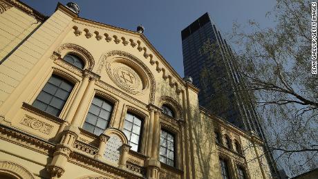 The Nożyk Synagogue, Warsaw&#39;s only surviving synagogue from before World War II, stands under a modern office building on April 12, 2018.