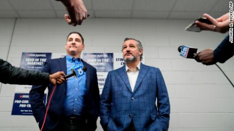 Josh Mandel, left, and Sen. Ted Cruz of Texas meet with members of the media before a campaign event at High Street Baptist Church, in Columbus, Ohio, Saturday, April 30, 2022. 