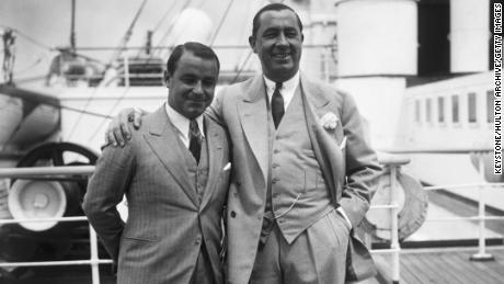 Hagen (right) stands with Gene Sarazen (left) on board the RMS Aquitania on arrrival in Southampton, June 21, 1933.