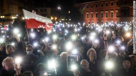 Protesters in Warsaw mark the first anniversary of a Polish Constitutional Court ruling that imposed a near-total ban on abortion, and to commemorate the death of a young pregnant Polish woman who was denied the procedure.