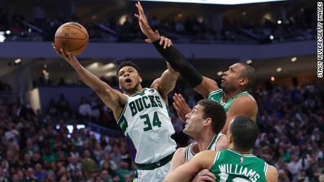 Antetokounmpo is defended by Horford during the second half of Game 3.