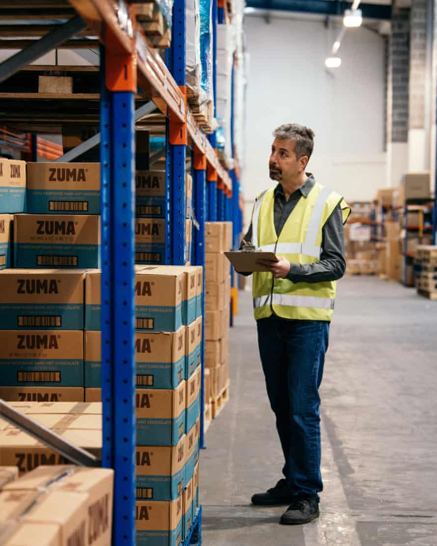 A worker in Beyond the Bean’s warehouse