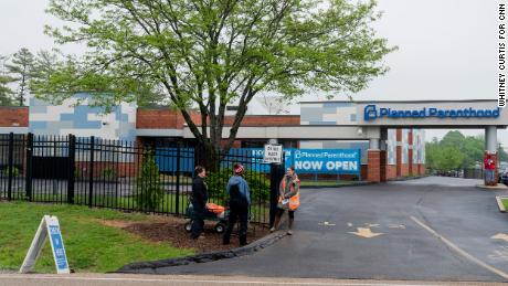 People representing Coalition for Life stand outside the Planned Parenthood clinic in Fairview Heights on Thursday, May 5.