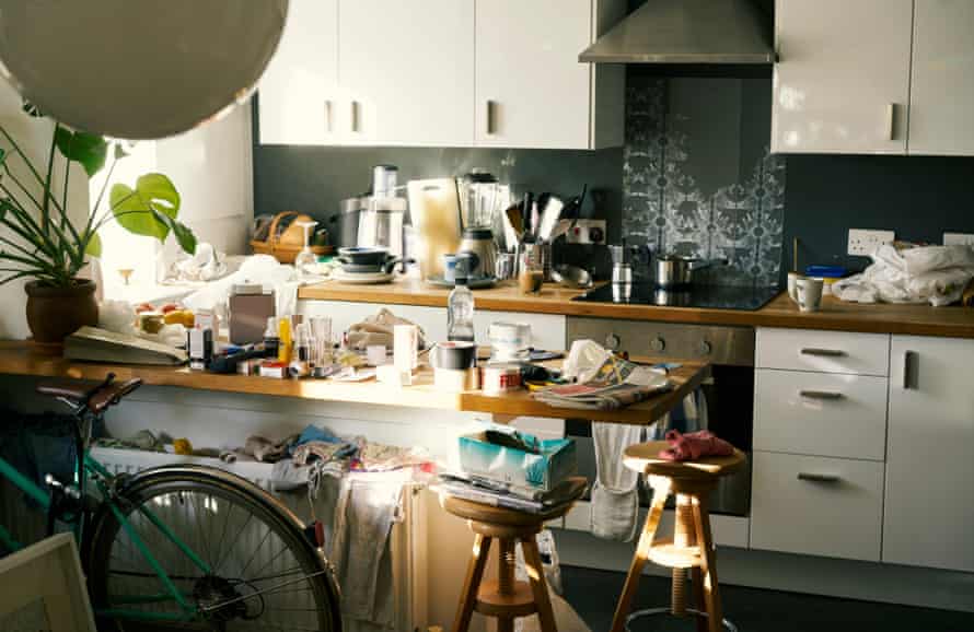 Counter tops covered in clutter