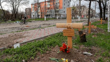 A view shows graves of civilians killed during the Ukraine-Russia conflict by the roadside in Mariupol on April 18, 2022.