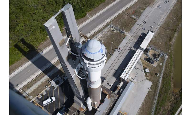 Boeing docks crew capsule to space station in test do-over