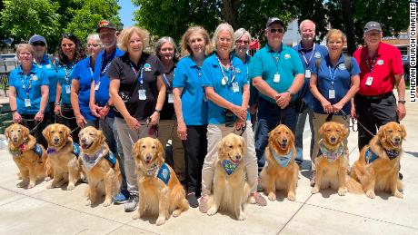 Dog handlers with Lutheran Church Charities offer comfort to grieving families in Uvalde, Texas.