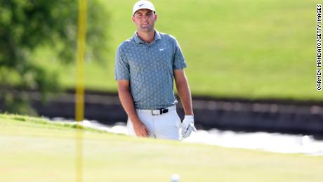 Scheffler reacts to his chip on the 18th green during the final round.