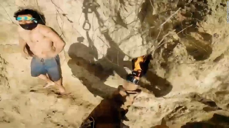 Helicopter spots man stuck on 500-foot cliff