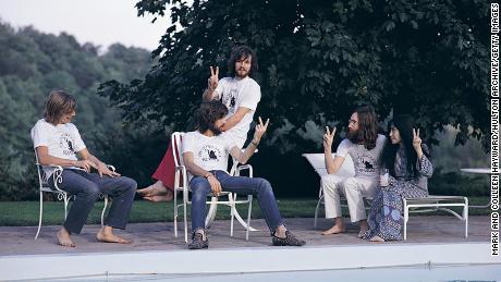 Left to right: drummer Alan White, Eric Clapton (seated), bassist Klaus Voorman, John Lennon and Yoko Ono in Toronto in 1969 