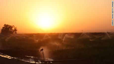 Sprinklers water fields in Kern County.