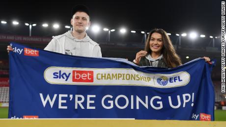 Brooks celebrates Bournemouth&#39;s promotion to the Premier League. 