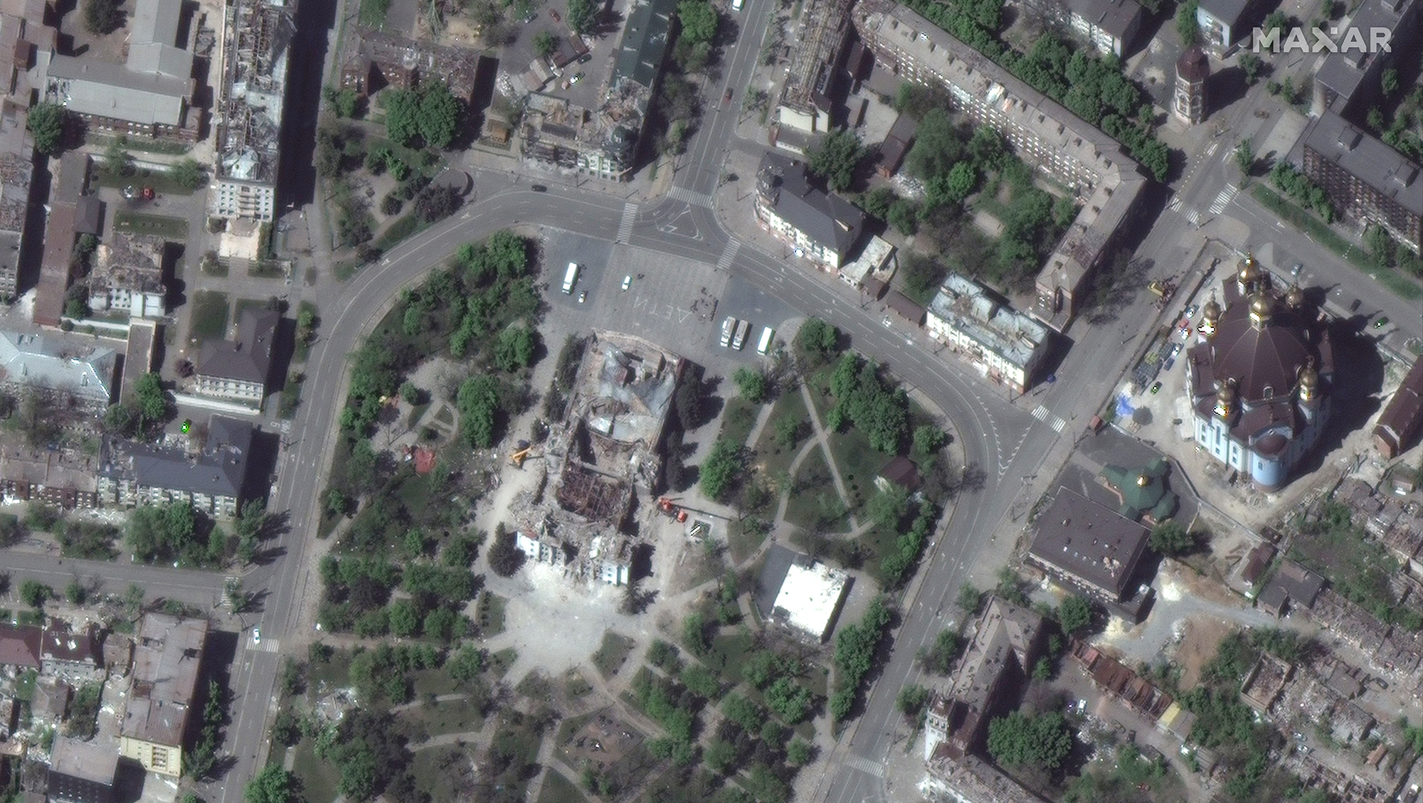 Satellite image showing cranes and vehicles at Mariupol Theater, in Mariupol, Ukraine, on May 12.