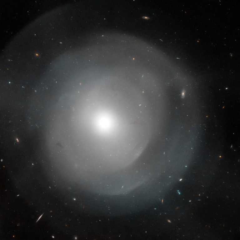 Hubble Space Telescope Peers Through Giant Elliptical Galaxy’s Layers