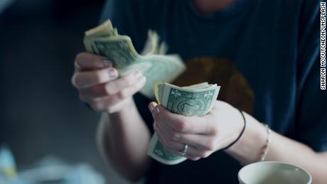 Could money buy happiness after all? A new study thinks so