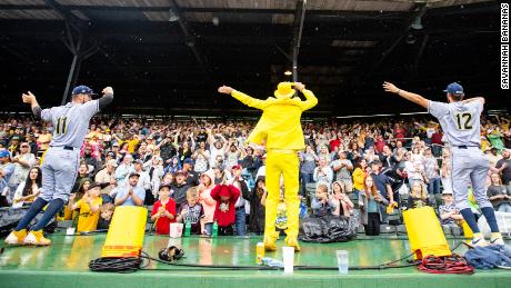 Jesse Cole, center, hypes up the crowd.