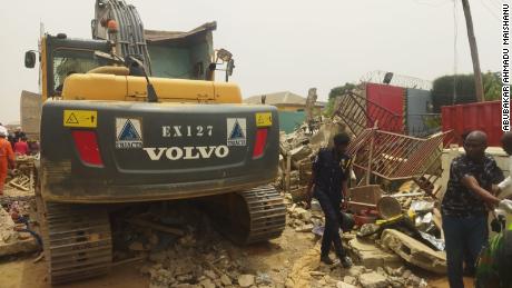 Rescue teams search for survivors of a gas blast in Nigeria&#39;s Kano State on May 17, 2022.