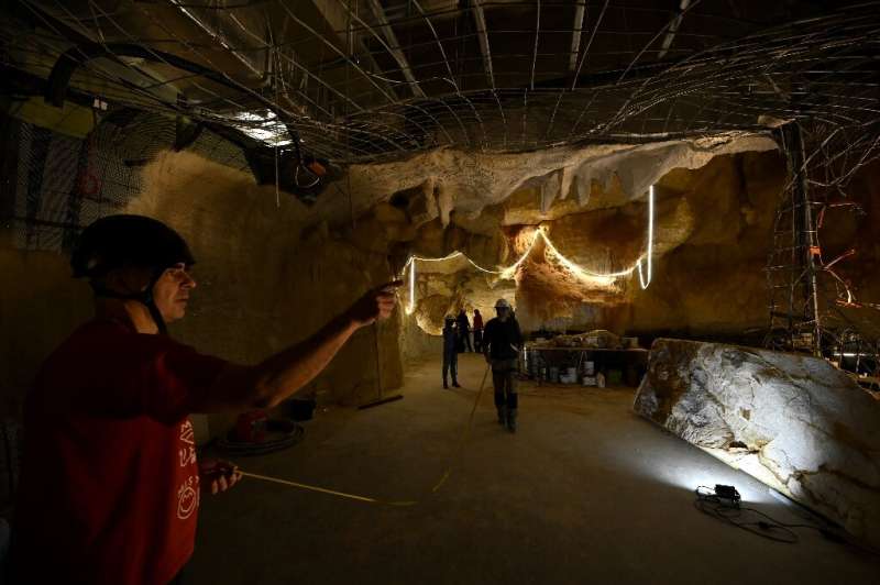 Workers in Marseille, France build an almost life-sized recreation of undersea Stone Age cave paintings found off the coast near