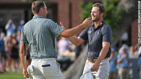 Scheffler and Burns shake hands after the final round.