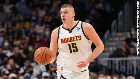 Jokic dribbles against the Memphis Grizzlies at Ball Arena on January 21, 2022.