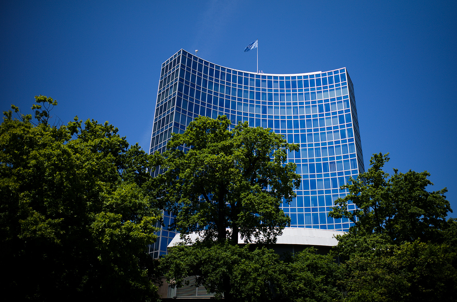 The United Nation flag waves in the wind on the top of an UN building in Geneva, Switzerland, Monday, June 14, 2021. A veteran Russian diplomat to the UN Office at Geneva says he handed in his resignation before sending out a scathing letter to foreign colleagues inveighing against the “aggressive war unleashed” by Russian President Vladimir Putin in Ukraine. Boris Bondarev, 41, confirmed his resignation in a letter delivered Monday morning at the Russian diplomatic mission after a diplomatic official passed on his English-language statement to The Associated Press. 