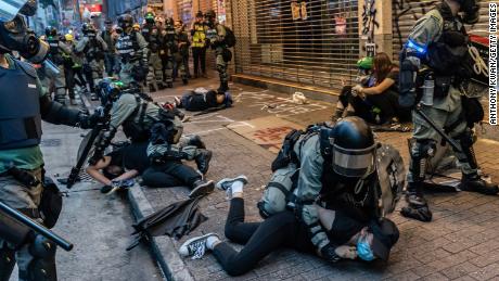 Pro-democracy protesters being arrested by police during a clash at a demonstration in Wan Chai district on October 6, 2019 in Hong Kong. (Photo by Amthony Kwan/Getty Images)