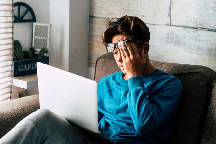 Stressed young person with a laptop