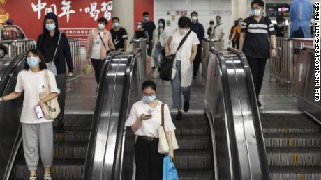 Commuters at a subway station in Shanghai on Wednesday.