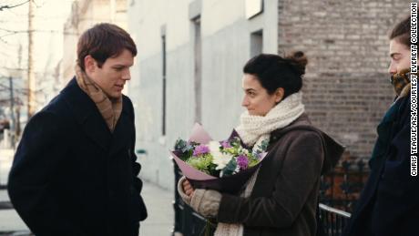 Jenny Slate (center, holding a bouquet) anchors &quot;Obvious Child,&quot; a rom-com in which her protagonist has an abortion and makes a romantic connection.