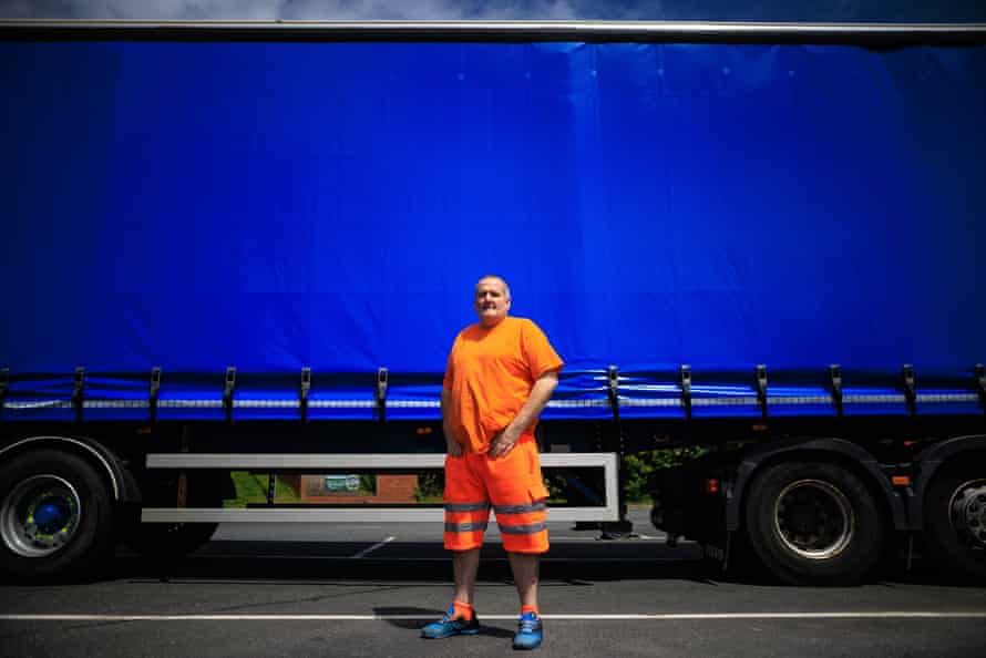 James Cunningham, from Glasgow, stands by his lorry.