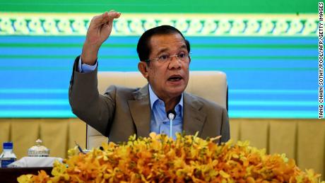 Cambodia&#39;s Prime Minister Hun Sen gestures during a news conference at the Peace Palace in Phnom Penh on September 17, 2021. 