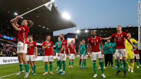 Hungary&#39;s players celebrate a famous win against England. 