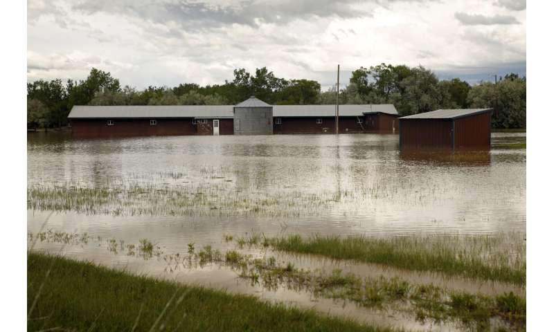 After Yellowstone, floodwaters near Montana's largest city