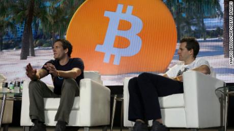 Tyler Winklevoss (L) and Cameron Winklevoss, founders of crypto exchange Gemini Trust Co., attend the crypto-currency conference Bitcoin 2021 Convention at the Mana Convention Center in Miami, Florida, on June 4, 2021. 