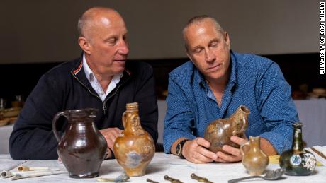 Julian (left) and Lincoln Barnwell show off some of their discoveries from the shipwreck. 