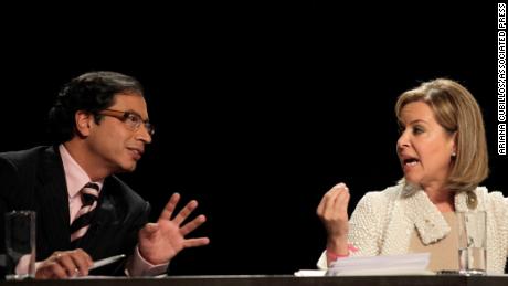 Petro, left, and Noemi Sanin, of the Conservative Party, gesture as they take part in a televized presidential debate in Bogota in May 2010. 